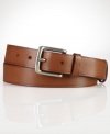 A lightweight leather belt with a lustrous nickel buckle lends instant polish to any ensemble.