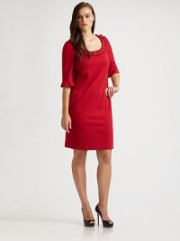 A bold design with a pretty jeweled neckline and ruffle detailed sleeves. Jeweled embellished scoop neck Elbow sleeves with ruffle cuffs Concealed back zip closure Princess seams Back vent Fully lined About 24 from natural waist 65% viscose/32% nylon/3% spandex Dry clean Made in Italy A bold design with a pretty jeweled neckline and ruffle detailed sleeves. Jeweled embellished scoop neck Elbow sleeves with ruffle cuffs Concealed back zip closure Princess seams Back vent Fully lined About 24 from natural waist 65% viscose/32% nylon/3% spandex Dry clean Made in Italy