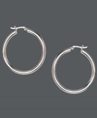 Simple hoops add an extra special touch, and Touch of Silver's smooth style is no exception. Crafted in silver-plated brass with a sterling silver click backing. Approximate diameter: 1-2/5 inches. Simple hoops add an extra special touch, and Touch of Silver's smooth style is no exception. Crafted in silver-plated brass with a sterling silver click backing. Approximate diameter: 1-2/5 inches.