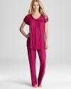 To sleep or to lounge, Midnight by Carole Hochman's versatile, cap-sleeve T-shirt and knit pants are a silky soft pair.