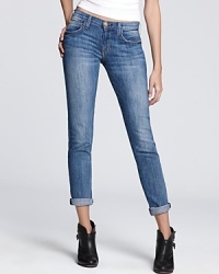 Blue is anything but basic when it comes in the form of these low rise Current/Elliott jeans, rolled at the cuffs for a retro rewind. Blue is anything but basic when it comes in the form of these low rise Current/Elliott jeans, rolled at the cuffs for a retro rewind.
