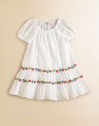 Tailored in airy cotton, this angelic frock is beautifully complemented with ruffled hem and two tiers of colorful, embroidered flowers.Elastic scoopneckShort puffed sleevesPullover styleRuffled hemCottonMachine washImported