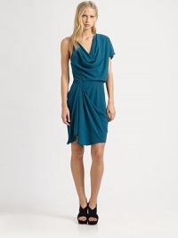 Single short flutter sleeve and asymmetrical draping spin this closet classic into an it-girl staple. CowlneckSingle short flutter sleeve; twisted strapAsymmetrically draped skirtAbout 21 from natural waistTriacetate/polyesterDry cleanImportedModel shown is 5'11 (178cm) wearing US size Small.This style runs true to size. We recommend ordering your usual size for a standard fit. Single short flutter sleeve and asymmetrical draping spin this closet classic into an it-girl staple. CowlneckSingle short flutter sleeve; twisted strapAsymmetrically draped skirtAbout 21 from natural waistTriacetate/polyesterDry cleanImportedModel shown is 5'11 (178cm) wearing US size Small.This style runs true to size. We recommend ordering your usual size for a standard fit.