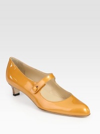 A demure heel lends vintage charm to this sleek Mary Jane style of classic patent leather.Stacked heel, 1¼ (30mm) Button strap Leather lining and sole Padded insole Made in ItalyOUR FIT MODEL RECOMMENDS ordering one half size up as this style runs small. A demure heel lends vintage charm to this sleek Mary Jane style of classic patent leather.Stacked heel, 1¼ (30mm) Button strap Leather lining and sole Padded insole Made in ItalyOUR FIT MODEL RECOMMENDS ordering one half size up as this style runs small.