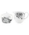 Subdued in shades of gray, the vivacious florals of Moonlit Garden dinnerware adorn this sleek sugar bowl and creamer set with modern romance. In durable Lenox porcelain.