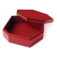 Vivid red lacquer adds a dash of drama to dressers, coffee tables and bookshelves. Vivid red lacquer adds a dash of drama to dressers, coffee tables and bookshelves.