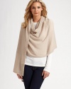 A soft, airy style in luxurious cashmere with a solid border. CashmereAbout 80 X 28Dry cleanImported