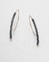 Elegantly simple arc-shaped hoops are strung with faceted beads of blackened sterling silver, capped with tiny beads of 14k gold.14k yellow gold and oxidized sterling silverLength, about 1.25PiercedMade in USA