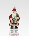 A gorgeously detailed vintage Santa wears rich robes with glitter, beaded textures and intricate patterns, all crafted of mouth-blown, hand-painted glass, an exquisite heirloom for your tree.Glass6.5H X 3W X 2.5DImported