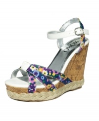 A flirty, little sandal for warm, summer days - and nights! The Taka design by XOXO features a little bit of everything: printed fabric, dainty straps, a cork wedge and woven espadrille detailing. A flirty, little sandal for warm, summer days - and nights! The Taka design by XOXO features a little bit of everything: printed fabric, dainty straps, a cork wedge and woven espadrille detailing.