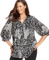 Enliven your neutral bottoms with Alfani's three-quarter-sleeve plus size blouse, flaunting a bold print. (Clearance)