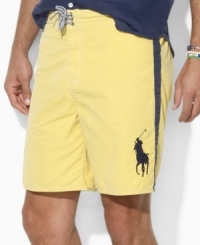 An applied 3 lends sporty appeal to a vibrant swim trunk, crafted from a lightweight cotton blend with contrast stripes and a drawstring waist for the perfect mix of style and comfort. An applied 3 lends sporty appeal to a vibrant swim trunk, crafted from a lightweight cotton blend with contrast stripes and a drawstring waist for the perfect mix of style and comfort.
