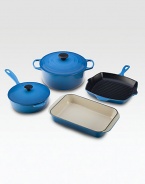 This essential collection of Le Creuset cast iron is perfect for newlyweds or a new kitchen. Durable stoneware evenly distributes and retains heat.