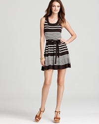 At once sophisticated and youthful, this Shoshanna sweater dress boasts contrasting stripes for a graphic punch. At once sophisticated and youthful, this Shoshanna sweater dress boasts contrasting stripes for a graphic punch.