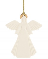 Bless your tree with this beautiful angle ornament from Lenox in pure white porcelain. With gold halo and hanging thread. Bless your tree with this beautiful angle ornament from Lenox in pure white porcelain. With gold halo and hanging thread.