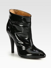 A raised t-strap is at the center of this patent leather silhouette, with a timeless point toe and piercing heel. Self-covered heel, 4½ (115mm)Patent leather upperPoint toePull-on styleLeather lining and solePadded insoleMade in Italy A raised t-strap is at the center of this patent leather silhouette, with a timeless point toe and piercing heel. Self-covered heel, 4½ (115mm)Patent leather upperPoint toePull-on styleLeather lining and solePadded insoleMade in Italy