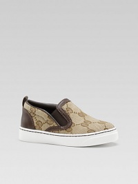 Casual slip-ons in original GG fabric, with leather trim and elastic detail.Fabric upper Slip-on Rubber sole Made in Italy Additional InformationKid's Shoe Size Guide (European Equivalent) Casual slip-ons in original GG fabric, with leather trim and elastic detail.Fabric upper Slip-on Rubber sole Made in Italy Additional InformationKid's Shoe Size Guide (European Equivalent)