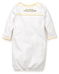 This trio of bright-eyed embroidered owls perched on a tree limb will keep baby company as they sleep through the night in this soft cotton sleep sack. The elastic bottom hem makes the late-night diaper change a bit easier. This trio of bright-eyed embroidered owls perched on a tree limb will keep baby company as they sleep through the night in this soft cotton sleep sack. The elastic bottom hem makes the late-night diaper change a bit easier.