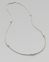 A intricately woven piece accented periodically with oblong station beads. Sterling silver Length, about 24 Imported 