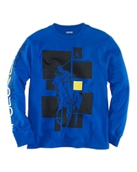 A classic crewneck is crafted from soft cotton jersey with Ralph Lauren's sporty signature accenting the chest and right arm for relaxed refinement. A classic crewneck is crafted from soft cotton jersey with Ralph Lauren's sporty signature accenting the chest and right arm for relaxed refinement.