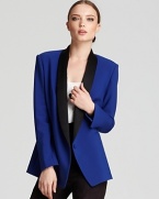 Your take on his luxe, this tux-inspired blazer features feminine details on a structured classic: shawl collar, faux front pockets, contrast silk lining peeking out from the cuffs.