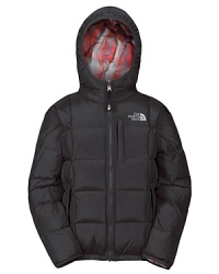 A reversible down jacket with hood, one side plaid and the other solid for two distinct sporty looks. A reversible down jacket with hood, one side plaid and the other solid for two distinct sporty looks.