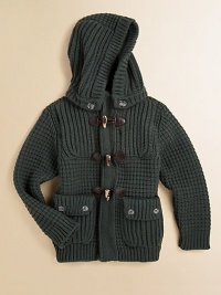 A rustic hip-length layer in a chunky waffle knit with a versatile detachable hood and preppy toggle details.Detachable button hoodRibbed stand collarLong sleeves with ribbed cuffsElbow patch detailFront toggle closureFront patch button pocketsRibbed hem80% wool/20% nylonHand washMade in Italy A rustic hip-length layer in a chunky waffle knit with a versatile detachable hood and preppy toggle details.Detachable button hoodRibbed stand collarLong sleeves with ribbed cuffsElbow patch detailFront toggle closureFront patch button pocketsRibbed hem80% wool/20% nylonHand washMade in Italy
