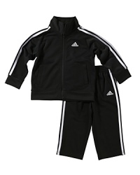 Essential sports gear from Adidas, the lightweight, breathable warm-up jacket and pant will have your athlete prepared and protected for whatever the next quarter calls for. Essential sports gear from Adidas, the lightweight, breathable warm-up jacket and pant will have your athlete prepared and protected for whatever the next quarter calls for.