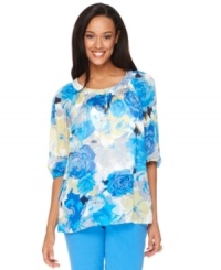 A blooming print illuminates Charter Club's three-quarter sleeve plus size top for season-perfect style. A blooming print illuminates Charter Club's three-quarter sleeve plus size top for season-perfect style.