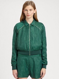 Transform this retro crinkled jacket into a vest by simply removing the sleeves. Point collarFront zipperRemovable long sleevesZipper trimSplit kangaroo pocketsZippered slash pocketsBanded hemAbout 29 from shoulder to hemPolyester/cuproDry cleanImportedSIZE & FITModel shown is 5'10 (177cm) wearing US size 4. Transform this retro crinkled jacket into a vest by simply removing the sleeves. Point collarFront zipperRemovable long sleevesZipper trimSplit kangaroo pocketsZippered slash pocketsBanded hemAbout 29 from shoulder to hemPolyester/cuproDry cleanImportedSIZE & FITModel shown is 5'10 (177cm) wearing US size 4.