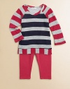 Two tones of wide rugby stripes on a cozy waffle knit with subtle sparkle join solid jersey leggings in this delightful duo. TopScoop necklineLong raglan sleevesVertical striped hem Pants Elastic waistbandSmooth jerseySlim legging fitTop: rayon/modal/cotton/LurexPants: cotton/modal/spandexMachine washImportedAdditional InformationKid's Apparel Size Guide 