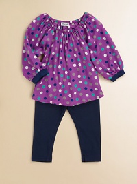 A mod-inspired, colorful polka dot print adorns a gathered tunic and paired with matching leggings for a charming set. Tunic Gathered elasticized round necklineLong puff sleevesPullover style Leggings Elastic waistband47% pima cotton/47% modal/6% spandexLeggings: RayonMachine washImported A mod-inspired, colorful polka dot print adorns a gathered tunic and paired with matching leggings for a charming set. Tunic Gathered elasticized round necklineLong puff sleevesPullover style Leggings Elastic waistband47% pima cotton/47% modal/6% spandexLeggings: RayonMachine washImported