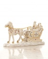 Just a sleigh ride away from the North Pole is a little village, untouched by time, called Mistletoe Park. The horse-drawn carriage is a staple of village life, and this fine example is sculpted with dashing 24-carat gold detail.