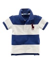 A colorful striped design accents the classic polo shirt in breathable jersey-knit cotton.