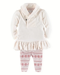 Paired with eye-popping snowflake leggings, plush velour is given a truly girly makeover with a sparkling rhinestone button, puffed sleeves and a ruffled hem. Paired with eye-popping snowflake leggings, plush velour is given a truly girly makeover with a sparkling rhinestone button, puffed sleeves and a ruffled hem.