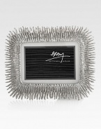 Showcase your most cherished photos in this exuberant, handcrafted frame.From the Flights of Fancy CollectionGold plateMatte allows display of either 4 X 6 or 5 X 7 photoOverall, 10.25W X 8.25HImported