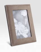 Display your memories in this handmade frame, wrapped in viper-printed nubuck leather with sturdy metal easel and convenient rear drop-down door for easy access.LeatherMade in USA DIMENSION INFORMATION 4 X 65 X 7