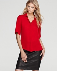 A vibrant silk Theory top, designed to infuse your favorite skinnies or classic pencil skirts, with a colorful complement. A vibrant silk Theory top, designed to infuse your favorite skinnies or classic pencil skirts, with a colorful complement.