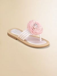 Not for the beach, these party flip flops are graced with soft tulle rosettes for a fun, festive look.Terylene satin upperThong front with multi straps across the middleComposite rubber solePadded insoleFaux leather liningImported Not for the beach, these party flip flops are graced with soft tulle rosettes for a fun, festive look.Terylene satin upperThong front with multi straps across the middleComposite rubber solePadded insoleFaux leather liningImported