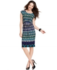 NY Collection's dress will jazz up your wardrobe with its vibrant print and tailored touches. NY Collection's dress will jazz up your wardrobe with its vibrant print and tailored touches.