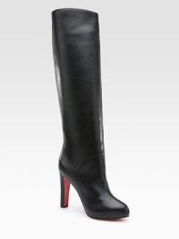 Lustrous leather knee-high style with a covered heel and platform. Self-covered heel, 4 (100mm) Covered platform, ¾ (20mm) Compares to a 3¼ heel (80mm) Shaft, 17 Leg circumference, 14 Leather upper Pull-on style Leather lining Signature red leather sole Padded insole Made in Italy Lustrous leather knee-high style with a covered heel and platform. Self-covered heel, 4 (100mm) Covered platform, ¾ (20mm) Compares to a 3¼ heel (80mm) Shaft, 17 Leg circumference, 14 Leather upper Pull-on style Leather lining Signature red leather sole Padded insole Made in Italy