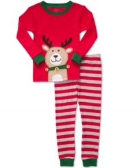 He'll lead the charge to holiday spirit as he drifts off to sleep in this fun reindeer shirt and striped pant pajamas set from Carter's. He'll lead the charge to holiday spirit as he drifts off to sleep in this fun reindeer shirt and striped pant pajamas set from Carter's.