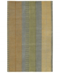 Add urban flair to your pad with Surya's contemporary rug from the Artist Studio collection. Muted yellow, sage green and rust tones are styled in a grid motif against the slate grey background for a low-key, hip result. Crafted from dense wool pile, the Artist Studio rug offers a uniquely textured feel that is incredibly soft to the touch.