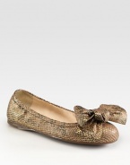Python stamped metallic leather flat with bow detail. Python stamped leather upperLeather liningRubber solePadded insoleMade in ItalyOUR FIT MODEL RECOMMENDS ordering one half size up as this style runs small. 