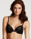 A floral lace bra in a cleavage enhancing style with a bump pad for extra lift. Style #013957