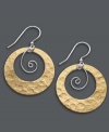 Shape up with this geometrically-savvy style. Jody Coyote's chic cut-out circles feature gold tone patina bronze and sterling silver swirls. Approximate drop: 1-1/2 inches.
