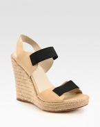 Comfy-chic espadrille wedge accompanied by soft leather straps and contrasting elastic trim. Braided hemp wedge, 4 (100mm)Braided hemp platform, 1 (25mm)Compares to a 3 heel (75mm)Elastic and leather upperLeather lining and solePadded insoleImported