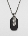 A simple sterling silver pendant necklace of black onyx is accented with chevron-textured sterling silver.Sterling silverBlack onyxLength, about 22 diam.Pendant, about ¾ x 1¼Imported