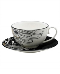 Bold florals inspired by 19th century Japanese textiles spring from the Chrysanthemum teacup of this set of striking, graphic and stylish dinnerware. The dishes feature a bouquet of cream, charcoal and gold on everyday fine china that offers the cool, modern look and unparalleled durability of Denby. Bold florals inspired by 19th century Japanese textiles spring from the Chrysanthemum teacup of this set of striking, graphic and stylish dinnerware. The dishes feature a bouquet of cream, charcoal and gold on everyday fine china that offers the cool, modern look and unparalleled durability of Denby.