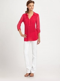Lightweight shirt with classic styling, updated by a two-tone design, three-quarter roll-tab sleeves and a hi-low hem. Point collarV-neckFront flap pocketsThree-quarter roll-tab sleevesHi-low hemRayonHand washMade in USAModel shown is 5'10 (177cm) wearing US size Small. Lightweight shirt with classic styling, updated by a two-tone design, three-quarter roll-tab sleeves and a hi-low hem. Point collarV-neckFront flap pocketsThree-quarter roll-tab sleevesHi-low hemRayonHand washMade in USAModel shown is 5'10 (177cm) wearing US size Small.